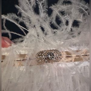 Feather white clutch with rhinestone handle